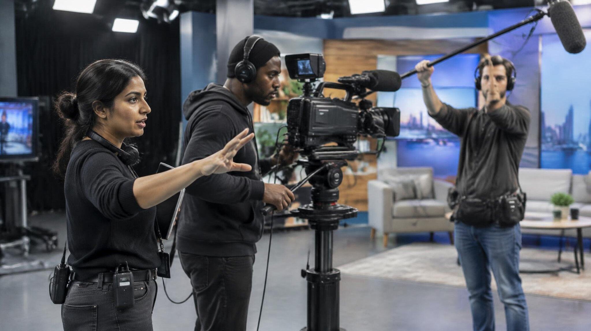 Production crew rehearsing a live studio broadcast
