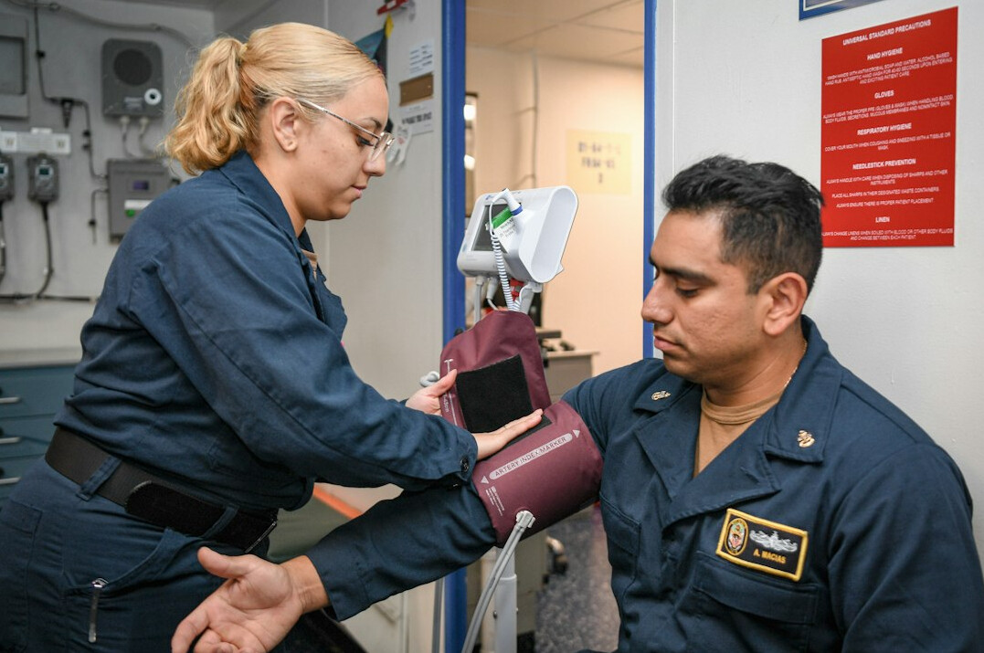 Instructor reviewing camera footage with a trainee