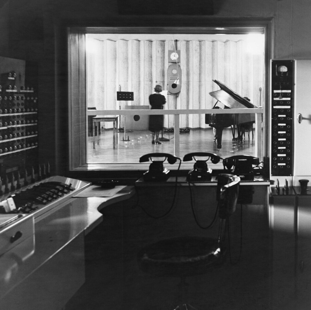 Television studio control room with multiple broadcast monitors